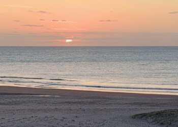 Sun Sets Over the Ocean